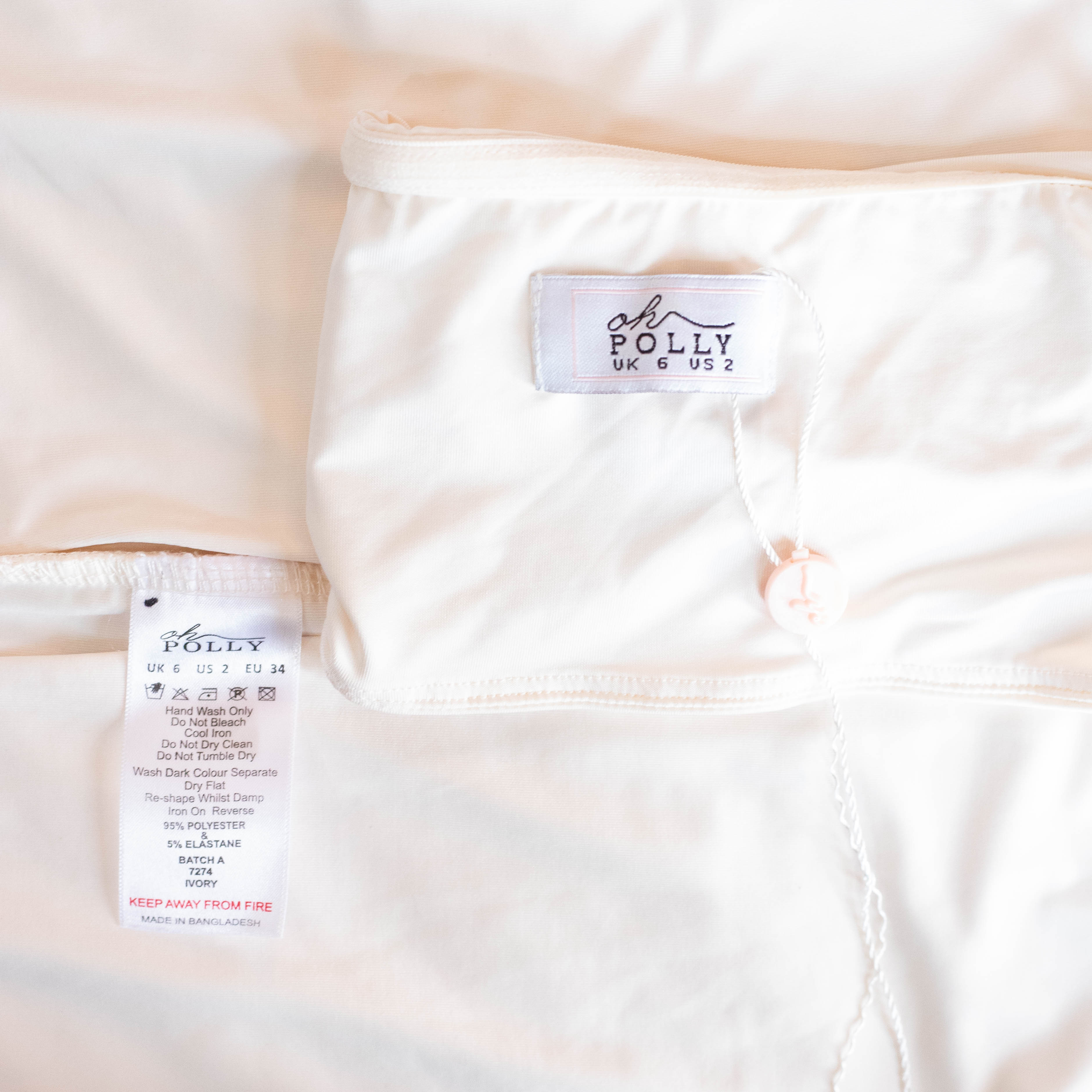 Oh Polly Ivory Ring-Detail Maxi Dress